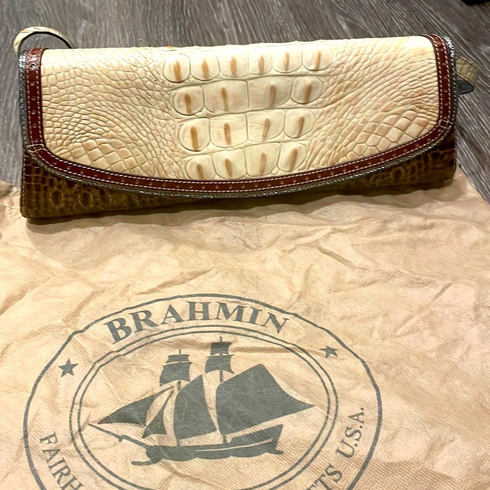 Brahmin purse three tones tan burgundy and silver.